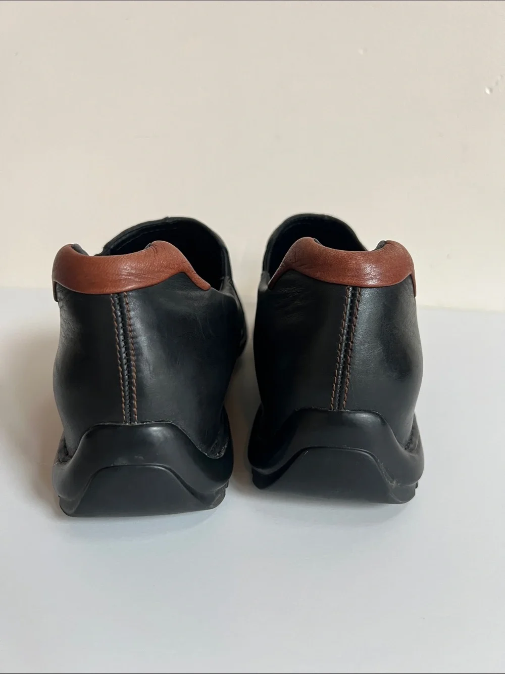 Cole Haan Black Leather Slip-On Loafers with Brown Heel Detail